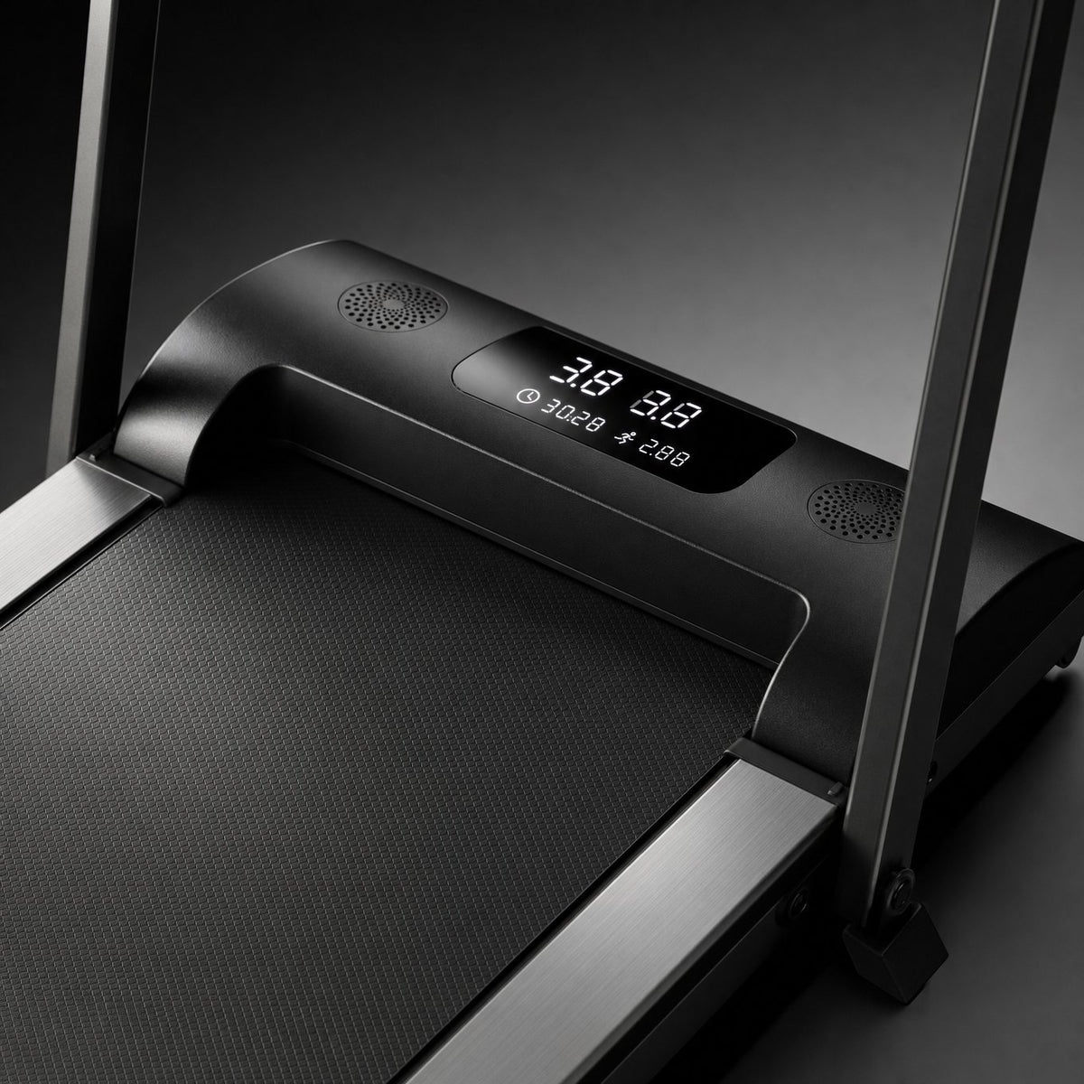Close up of walking pad treadmill LED console showing speed and time with built in speaker grilles