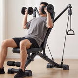 Adjustable weight bench in use - incline dumbbell press at home
