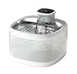 Automatic pet water dispenser 2L in white with stainless steel drinking tray and touch control host, water flowing into the bowl