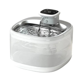 Automatic pet water dispenser 2L in white with stainless steel drinking tray and touch control host, water flowing into the bowl