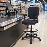 Cashier chair with footrest ring positioned behind a supermarket checkout counter