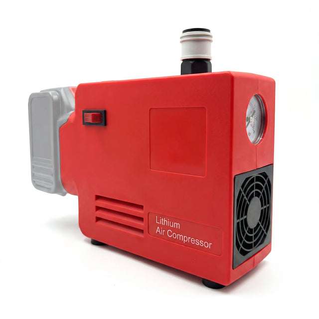 Cordless lithium air compressor in red with grey battery pack, pressure gauge and cooling fan, on a white background