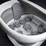 Close up of foot spa basin floor showing massage roller nodes and spiral centre roller