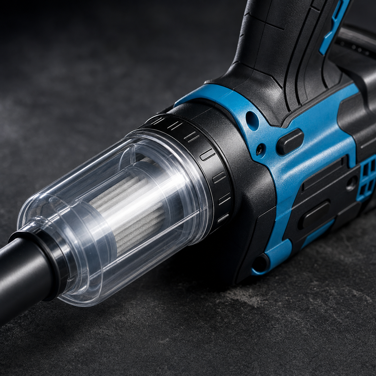 Close up of transparent cyclone dust canister and blue accent panels on cordless blower vacuum