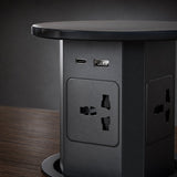 Close up detail of pop up socket USB Type C and USB Type A fast charging ports and universal AC outlet