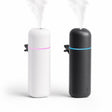 Mini car aroma diffuser in matte white and matte black with glowing LED rings and vent clips, on white background