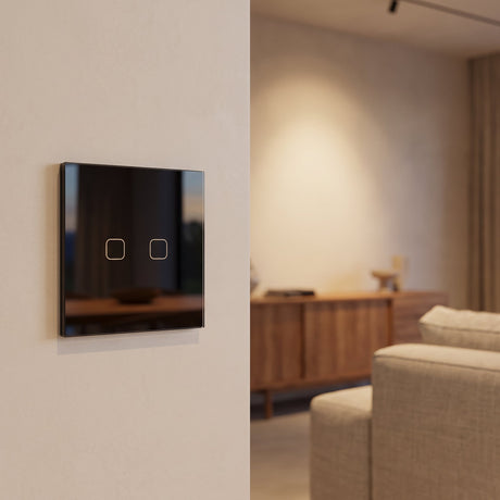 2 Gang black glass smart touch switch installed on a modern wall