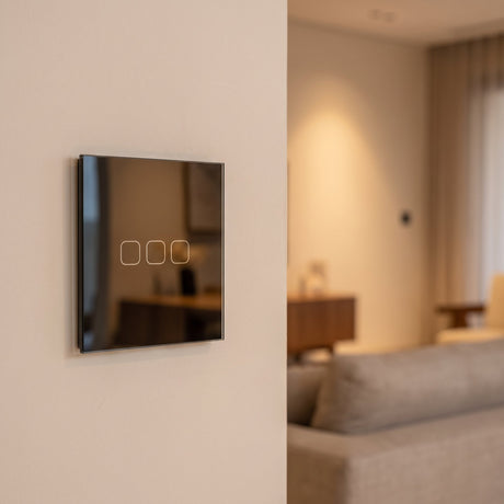 3 Gang black glass smart touch switch installed on a modern wall