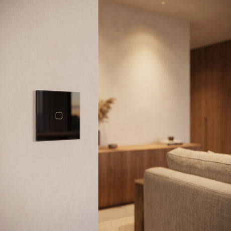 1 Gang black glass smart touch switch installed on a modern wall