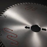 Close up of saw blade arbor bore, drive slots and laser cut expansion slot