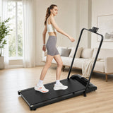 Woman walking on a slim walking pad treadmill in a bright modern living room