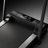 Close up of walking pad treadmill LED console showing speed and time with built in speaker grilles